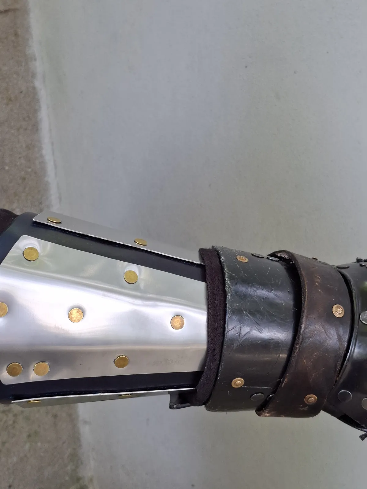 One of George's steel-plated leather bracers worn with a gauntlet