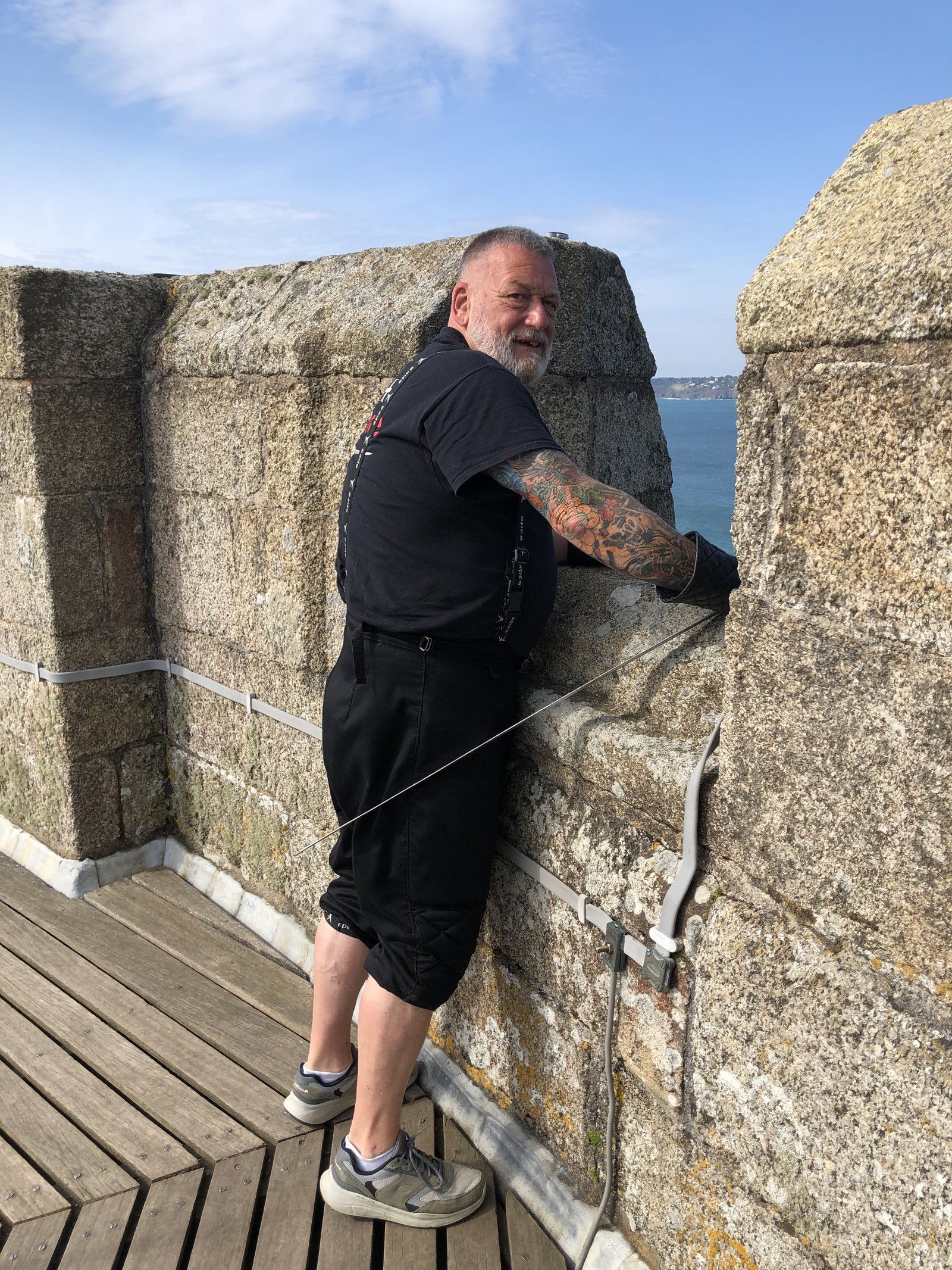 A HEMA Penzance member looking out from the Pendennis Castle ramparts