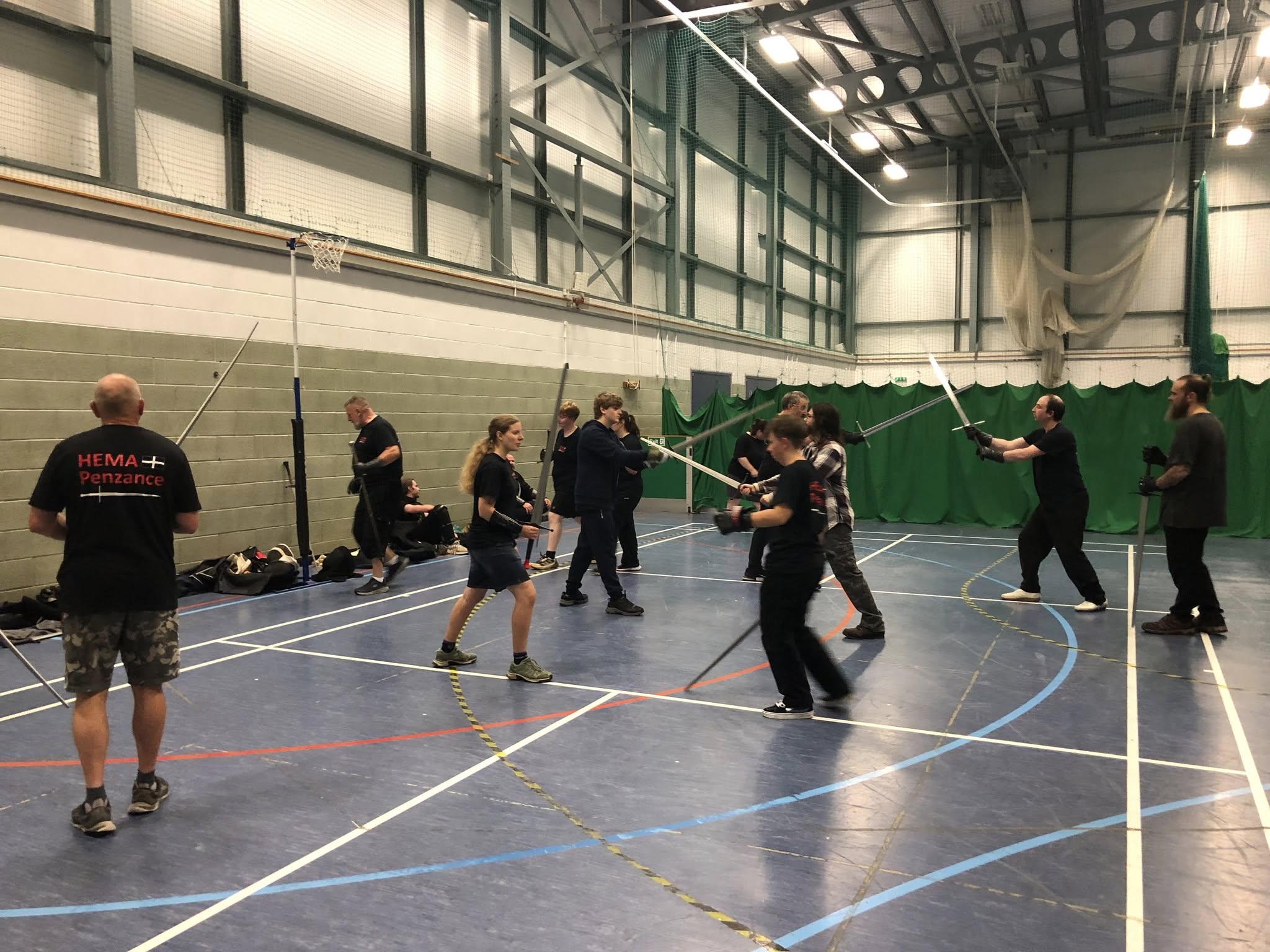 Full hall of members drilling longsword techniques