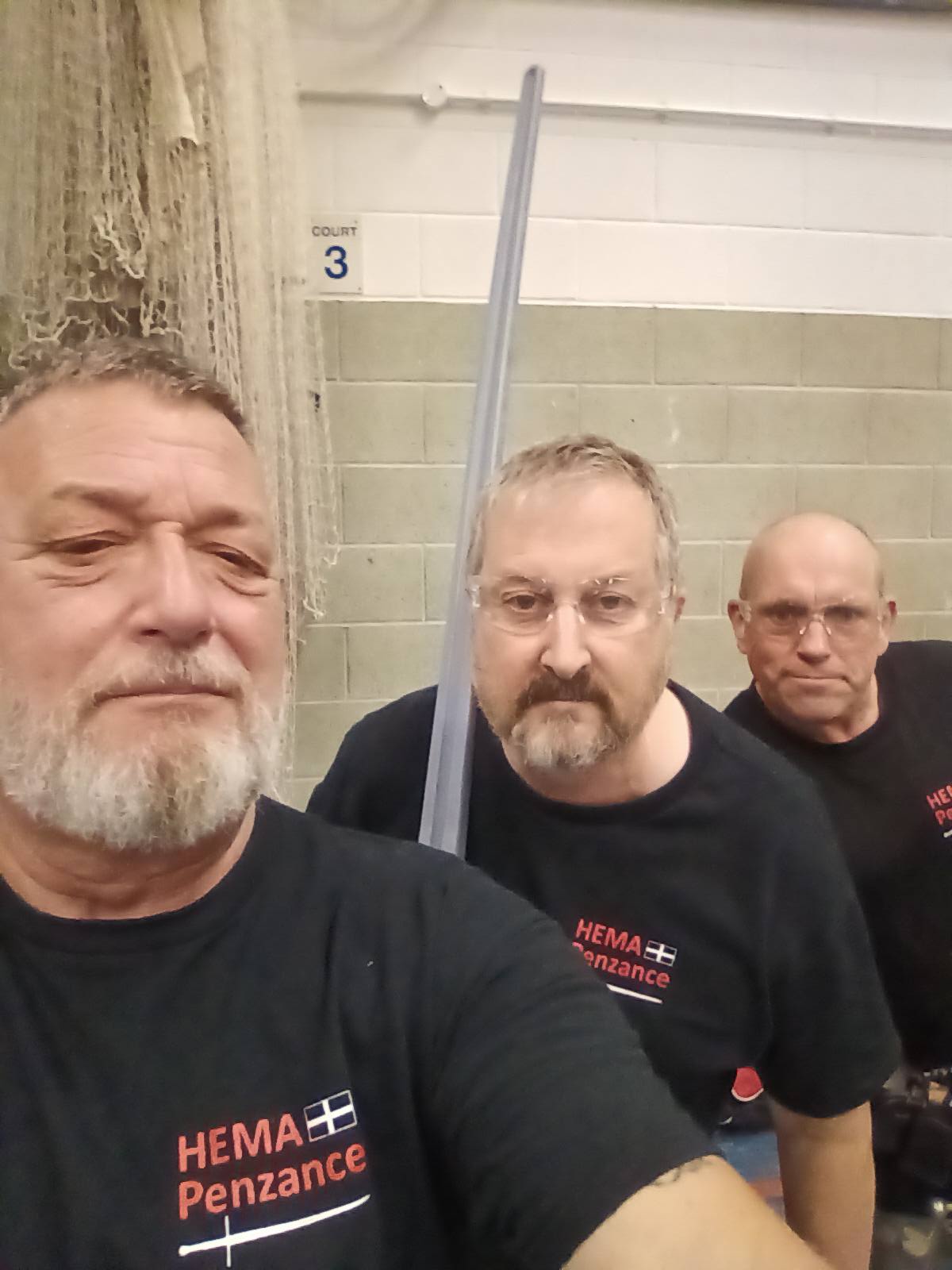 Steve and two members selfie with swords