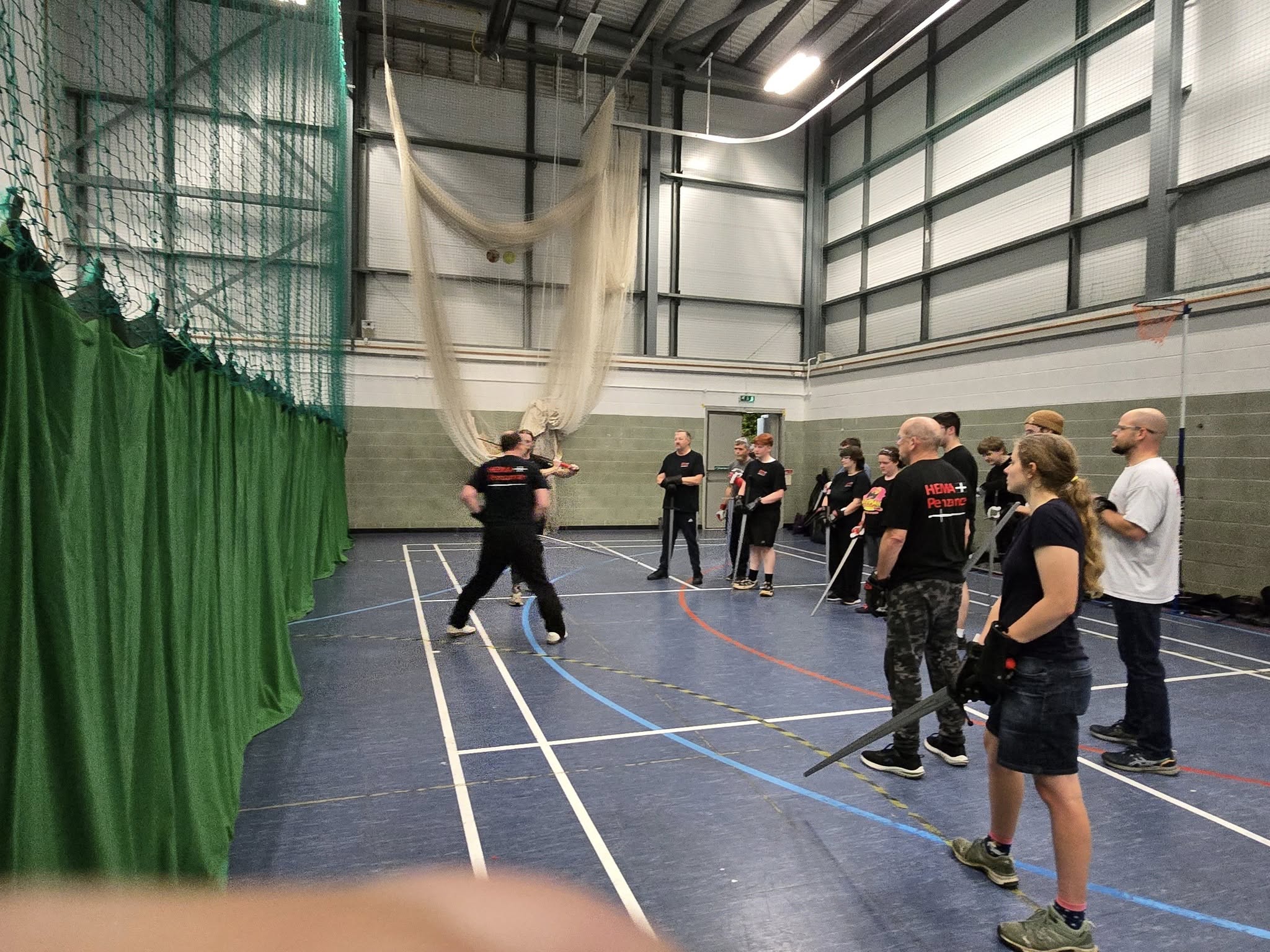 Wide view of the training hall during a session
